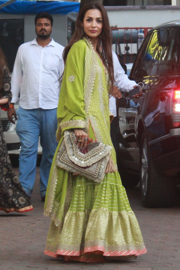 Malaika-Arora wearing Vipul Shah clutch