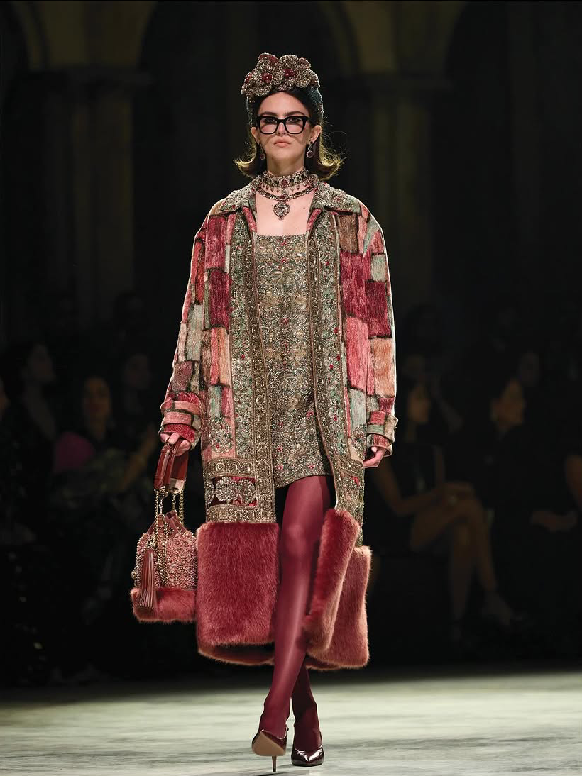 A luxe look: A faux fur overcoat paired with an embroidered mini dress